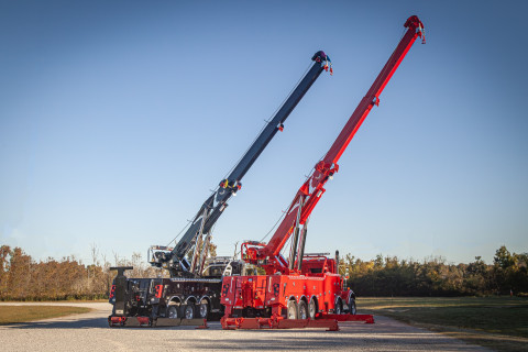 Two Century M65 units on a red Kenworth W900 and a black Peterbilt 589 twin-steer chassis rear