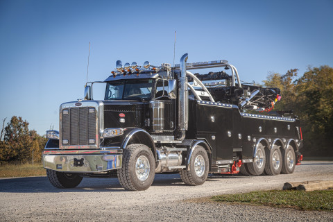 Century M65 on a black Peterbilt 589 Simard twin-steer chassis front photo