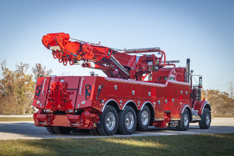 Century M65 on a red Kenworth W900 twin-steer chassis rear folded